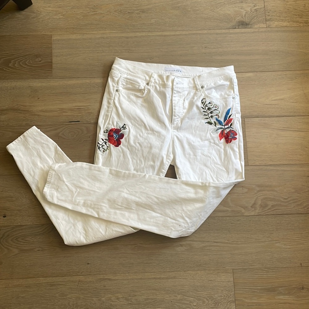White jeans with flower embroidery